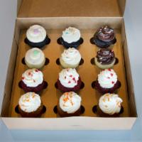 1 Dozen Assorted Mini Molly Cupcakes · A perfect bite-sized treat! Get an assortment of our vanilla, chocolate, and red velvet mini...
