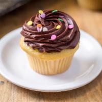 Classic Molly's Vanilla Cupcake · Picture shows our Classic - vanilla cake with chocolate frosting and sprinkles