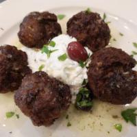 Keftedakia · Greek aromatic meatballs in a light lemon sauce.