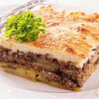Moussaka · Layers of potatoes, grilled eggplant, zucchini and ground beef, topped with Bechamel sauce. ...