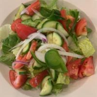 House Salad · Lettuce, tomatoes, cucumbers, onions and peppers.