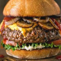 Telio Burger · 12 oz. beef ground blend chuck brisket sirloin beef burger with mushroom, bacon, Swiss chees...