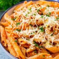 Penne ala Vodka · Served with salad, bread and butter and Romano cheese.