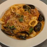 Seafood Pasta · Jumbo shrimp, scallops, mussels and calamari with creamy pink sauce.