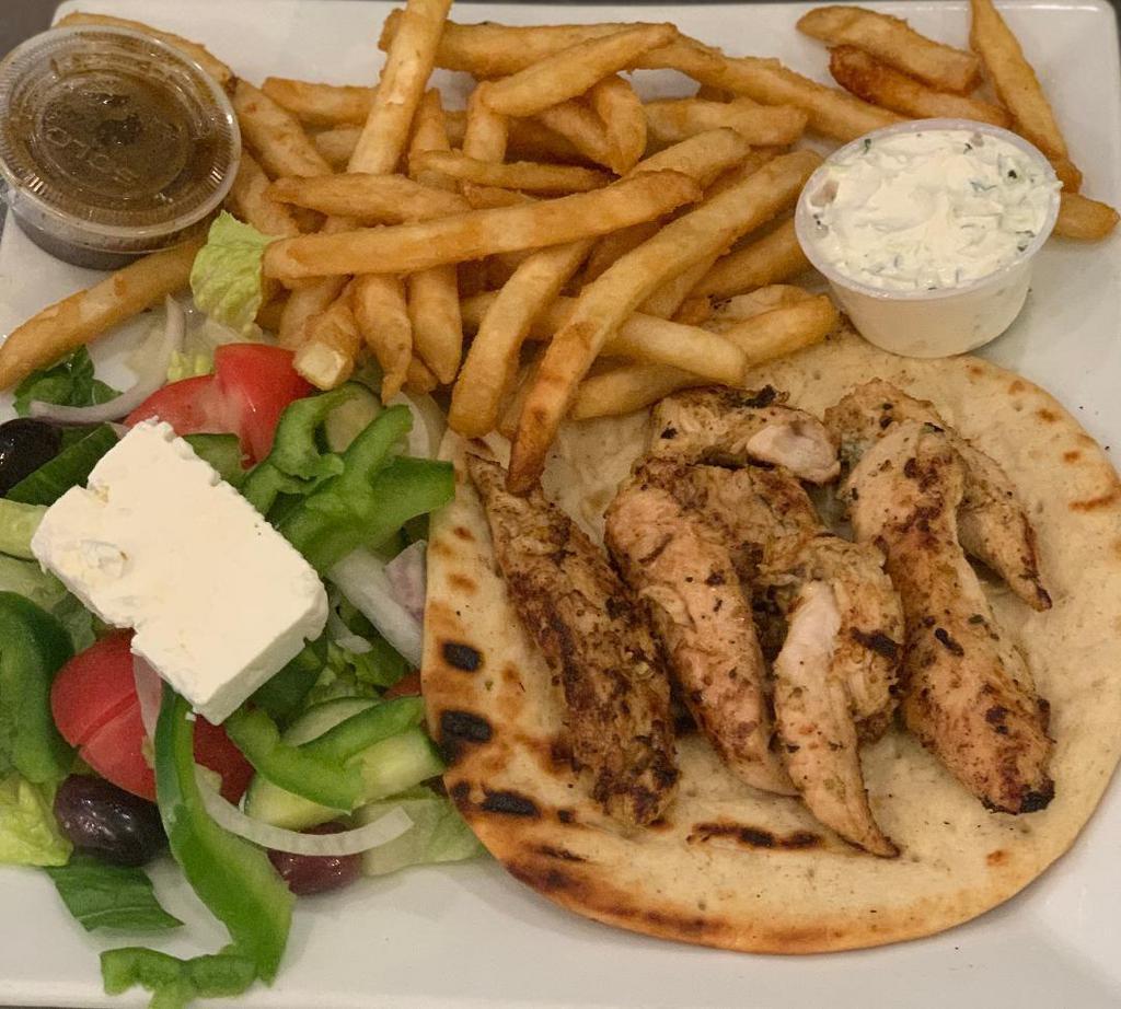 Chicken Souvlaki Sandwich Platter · Served on a pita with lettuce, tomatoes, onions, and tzatziki sauce. Comes with small Greek salad, pita bread, tzatziki sauce and french fries.