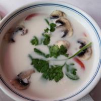 Tom Kha · Sliced chicken or shrimp and galanga in light coconut milk with mushroom and bell pepper.