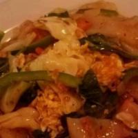 Drunken Noodle · Kee mao. Stir fried choice of meat with flat rice noodle, egg, hot chili, basil leaves and b...