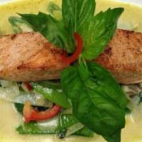 Pan Seared Salmon · Salmon in green curry, coconut milk, basil leaves, bamboo shoots, bell peppers and steamed v...