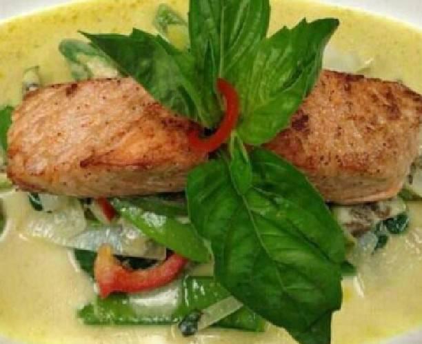 Pan Seared Salmon · Salmon in green curry, coconut milk, basil leaves, bamboo shoots, bell peppers and steamed vegetables. Spicy.