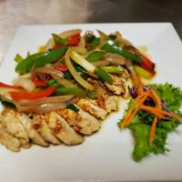 Pepper Chicken · Pan seared chicken breast served with white onions, bell peppers, scallions in garlic and le...
