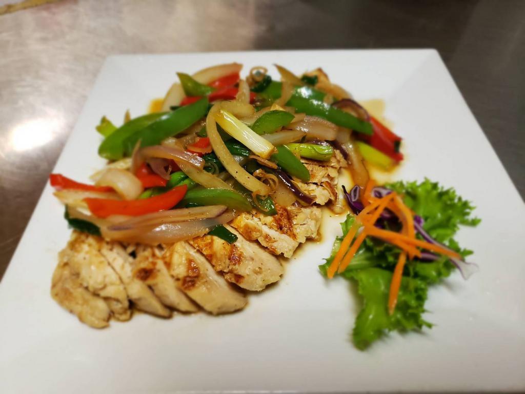 Pepper Chicken · Pan seared chicken breast served with white onions, bell peppers, scallions in garlic and lemongrass sauce.