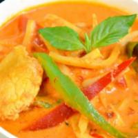 Red Curry · Choice of meat in red curry paste, coconut milk, bamboo shoots, green peas, bell peppers and...