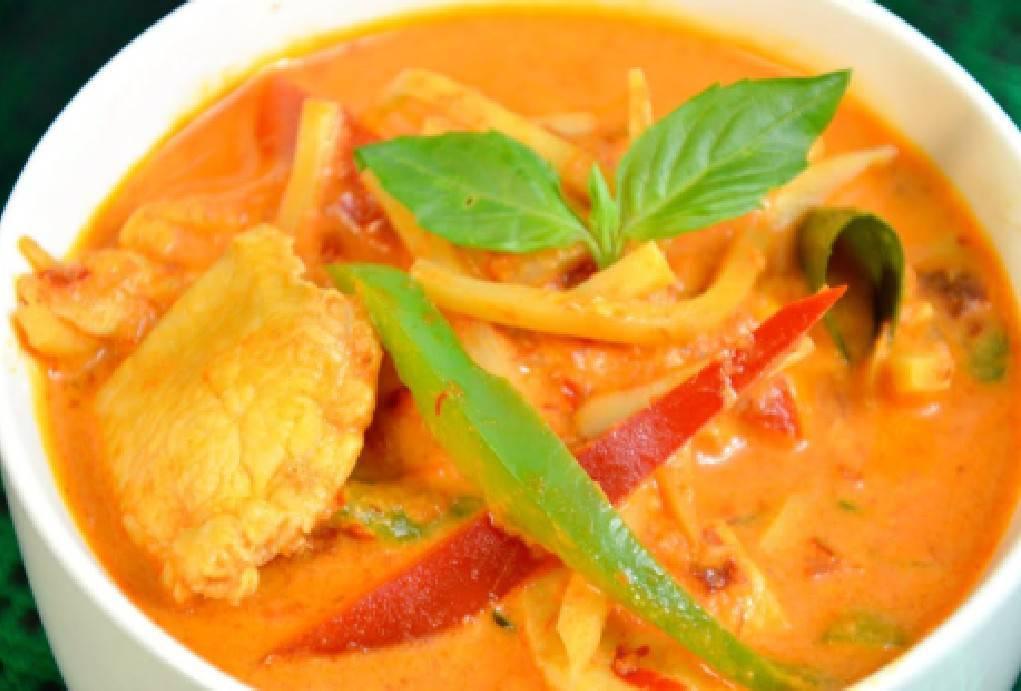 Red Curry · Choice of meat in red curry paste, coconut milk, bamboo shoots, green peas, bell peppers and basil leaves. Spicy.