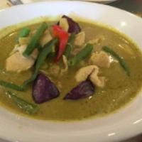 Green Curry · Choice of meat in green curry paste, coconut milk, bamboo shoots, green peas, bell peppers a...