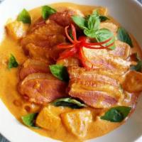 Thai Duck Curry · Deep fried duck in red curry sauce, coconut milk, basil leaves, bamboo shoot, bell pepper, a...