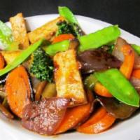Vegetables and Tofu · Mixed vegetables and deep fried tofu sautéed with house soy sauce.