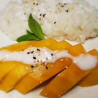 Mango Sticky Rice · Sweet coconut sticky rice with sweet mango topped with coconut milk.