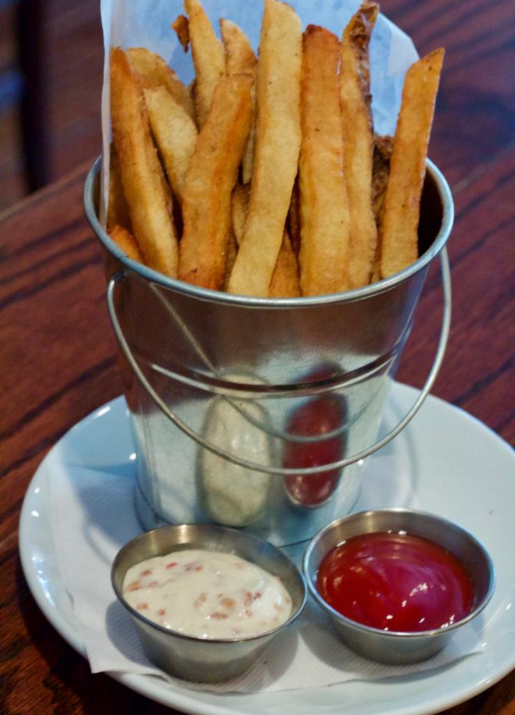 Hand Cut French Fries · with house made bacon ranch dipping sauce. 