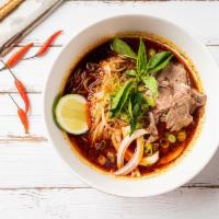 P2. Spicy Beef Pho Noodle Soup · Rare eye round, with rice noodle, served with spiced beef broth, onions, scallions.