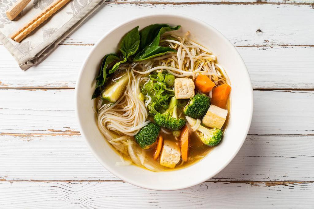 P7. Vegetarian Pho Noodle Soup · Mixed vegetables, with rice noodle, served with vegetarian broth soup, onions, scallions.