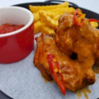 Panang Curry Wings · Five bone-in jumbo wings with Panang curry sauce