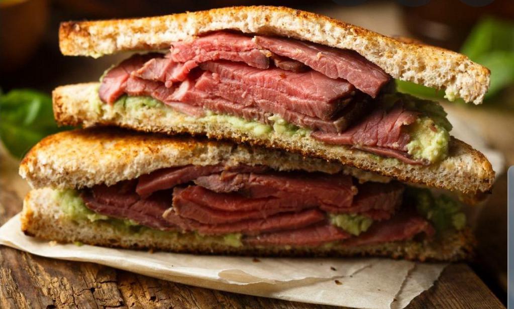 Roast Beef Sandwich · Roast Beef on a baguette served with jus. 