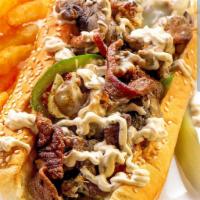 Philly Cheese Steak with Peppers and Onions · Steak, cheese, and caramelized onion sandwich.