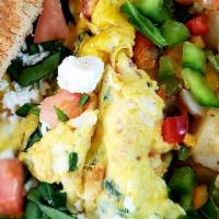 Greek Omelette · Eggs, feta cheese, spinach,olives,onion and tomato. Includes your choice of home fries or ha...