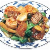 Happy Family · A combination of lobster meat, scallops, beef, chicken, roast pork, shrimp and Chinese veget...