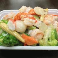 Seafood Combination · A combination of lobster meat, scallop, jumbo shrimp and crab meat sauteed with mixed vegeta...