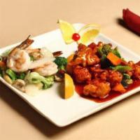 Dragon and Phoenix · General Tso's chicken and shrimp with Chinese vegetables in white sauce. Served with white r...