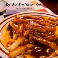 SWAMP FRIES · FRENCH FRIES WITH ROAST BEEF GRAVY AND CHEDDAR CHEESE SAUCE