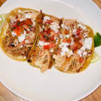 Natural Chicken Tacos · Served on a soft corn tortilla, melted Mexican cheese, queso fresco, pico de gallo, and sals...