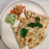 Chicken Quesadilla · Mexican cheese blend, pico de gallo, guacamole and sour cream