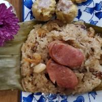Bah Jang or Steamed Sticky Rice Packet · It's sticky rice packet that is seasoned with soy sauce and has a soft peanut texture with t...