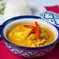 Golden Curry · Yellow curry, potatoes, onions and coconut milk. Served with steamed jasmine rice. 