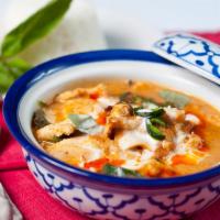 Panang Curry · Panang curry, peanuts, lime leaves, bell peppers, fresh basil and coconut milk. Served with ...