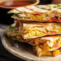 Ranch Quesadilla · Scrambled Eggs, Bacon, Hash Browns, and Pepper Jack Cheese