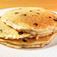 Chocolate Chips Pancakes · Pancakes stuffed with chocolate chips. Served with butter and syrup.