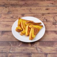 Challah French Toast · Dipped in egg butter.
