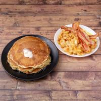 Super Breakfast · Pancakes or French toast with 2 eggs and bacon ham or sausage.