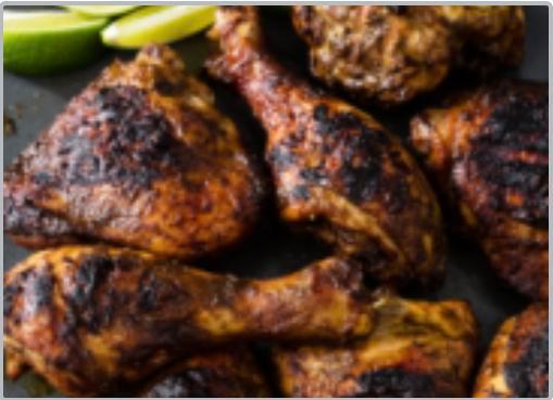 Jerk Chicken Special  · Jerk chicken served with rice and peas, cabbage and your choice of a Can soda or bottle of water
