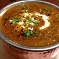 Dal Maharani · Slow simmered marpe beans flavored with tomatoes and ginger. Served with rice. Vegetarian.