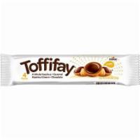 Toffifay  · 4 pieces A whole hazelnut • Caramel • hazelnut cream • chocolate  1.16OZ (33g)