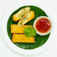 Vegetable spring rolls · Thai chili sauce.