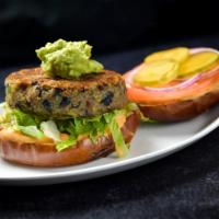 The Tree Hugger · Homemade Plant Junkie Quinoa/ Black Bean Burger, lettuce, tomato and chipotle mayo, served o...
