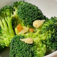 Garlic Broccoli · Garden fresh broccoli sauteed in garlic and extra virgin olive oil.