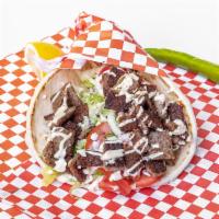 Lamb Gyro · Well seasoned lamb gyro cooked on the top griddle, rolled with pita bread, lettuce, tomatoes...