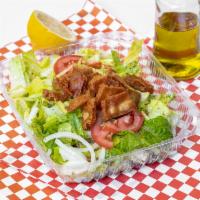 Ftuash Salad · Chopped romaine lettuce onions tomatoes dried mint with the special house dressing crispy pi...