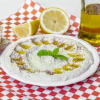 Hummus Plate · Pureed chickpeas with tahini sauce lemon juice serve with pita bread and extra virgin olive ...